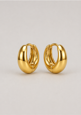 CORRINE ELONGATED DOME HUGGIE HOOP EARRING