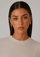 CORRINE ELONGATED DOME HUGGIE HOOP EARRING